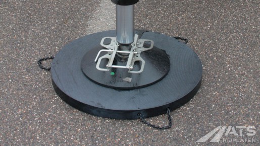 A plastic stamping plate in use